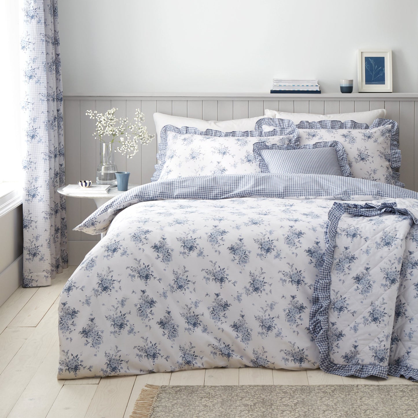 Lucie Floral Frill Reversible Duvet Cover Set in White / Blue by Catherine Lansfield