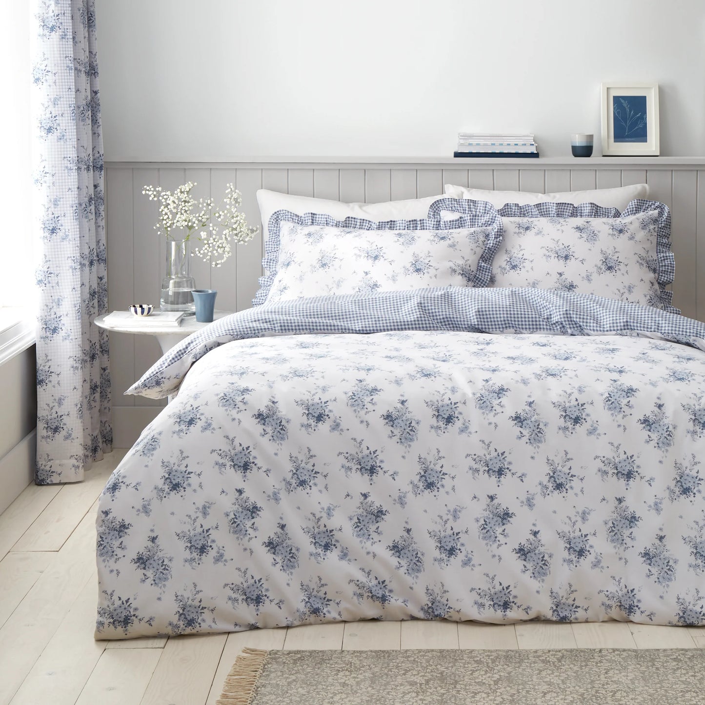 Lucie Floral Frill Reversible Duvet Cover Set in White / Blue by Catherine Lansfield