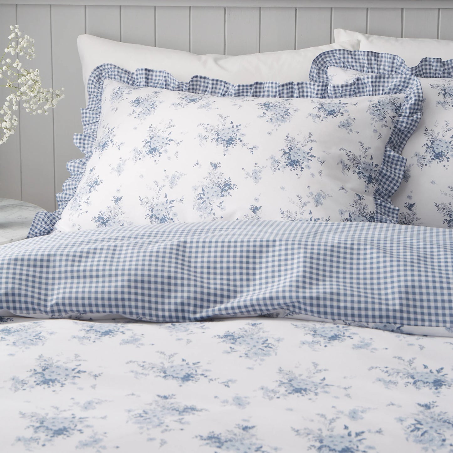 Lucie Floral Frill Reversible Duvet Cover Set in White / Blue by Catherine Lansfield