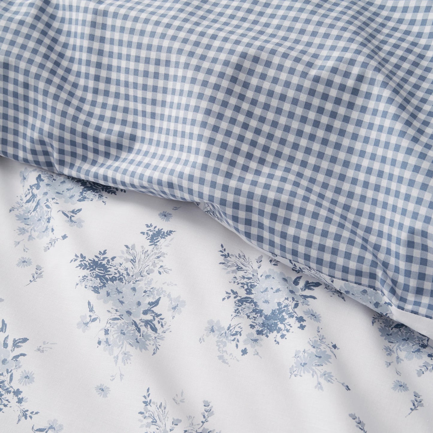 Lucie Floral Frill Reversible Duvet Cover Set in White / Blue by Catherine Lansfield